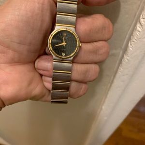 Raymond Weil Classic black face, two-tone steel and gold woman’s watch. Vintage.